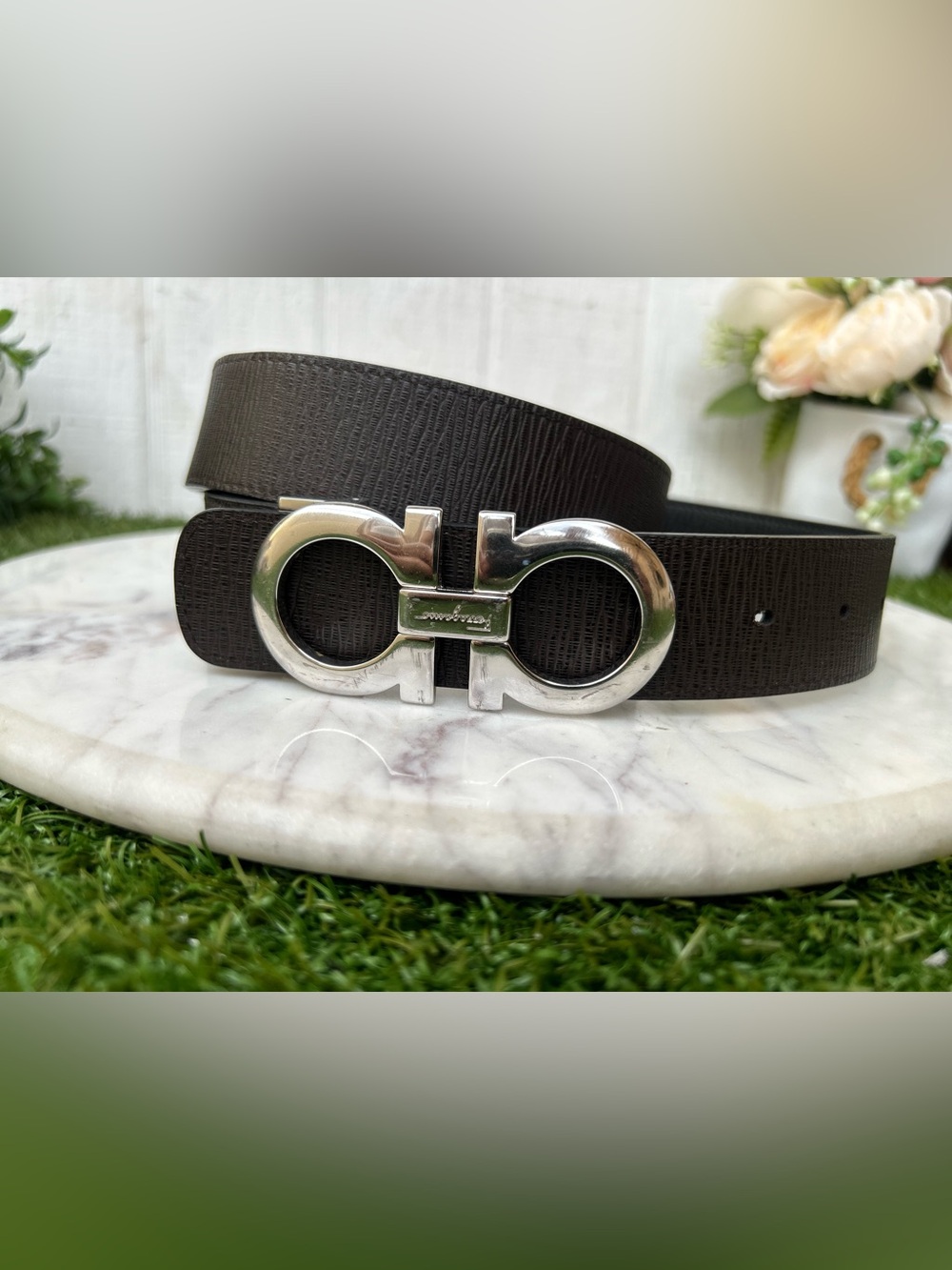 Ferragamo Reversible and adjustable Gancini belt  $595 Color: Black/Dark brown